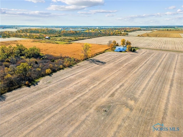 birds eye view of property featuring a rural view