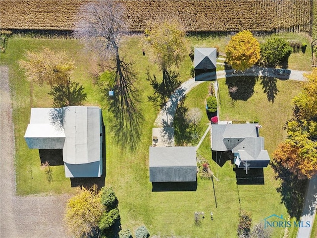 birds eye view of property featuring a rural view