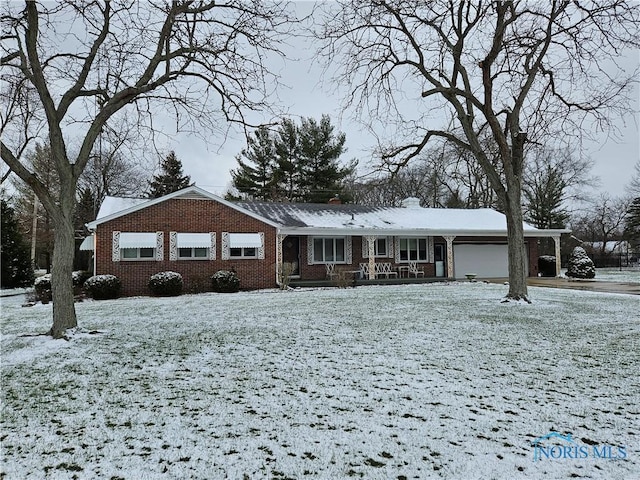 single story home with a garage