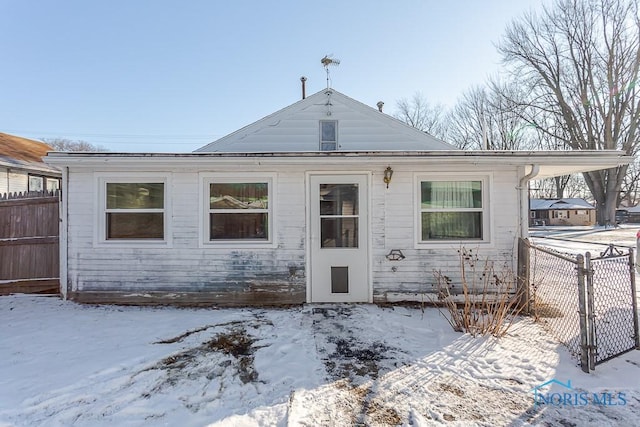 view of snow covered property