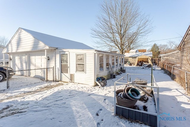 exterior space with a garage