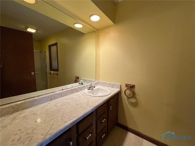 bathroom featuring vanity and tile patterned floors