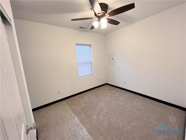 carpeted empty room with ceiling fan