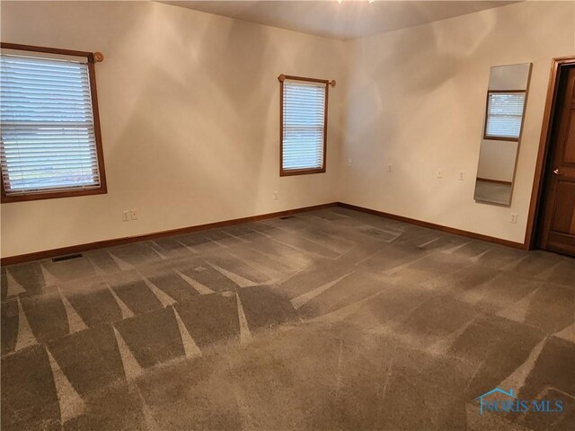 view of carpeted spare room