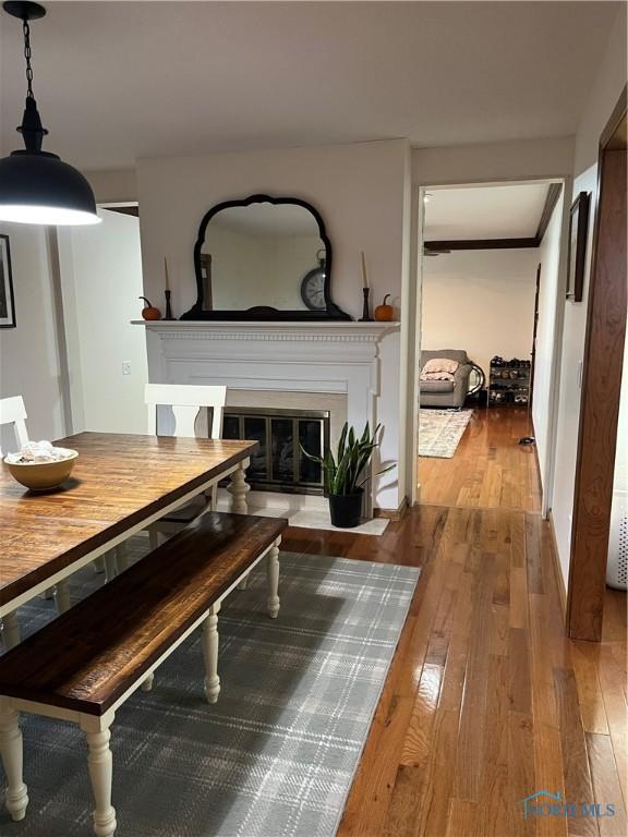 dining space featuring light wood-type flooring