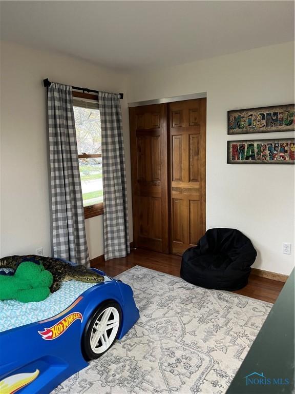 bedroom featuring hardwood / wood-style floors