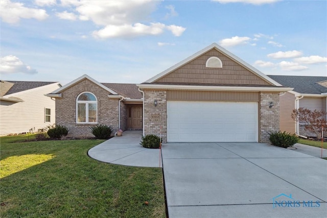 view of front of home featuring a garage and a front lawn