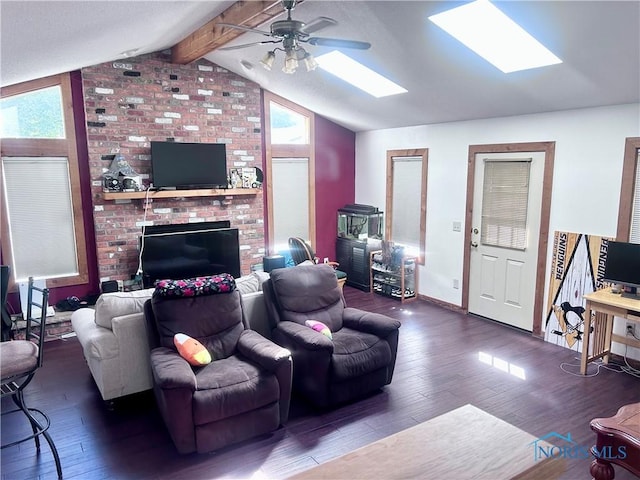 living room with dark hardwood / wood-style floors, lofted ceiling with skylight, ceiling fan, and plenty of natural light