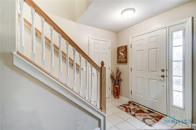 foyer entrance featuring light tile patterned floors