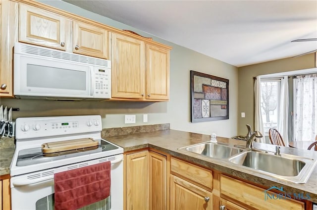 kitchen featuring sink, white appliances, and light brown cabinets