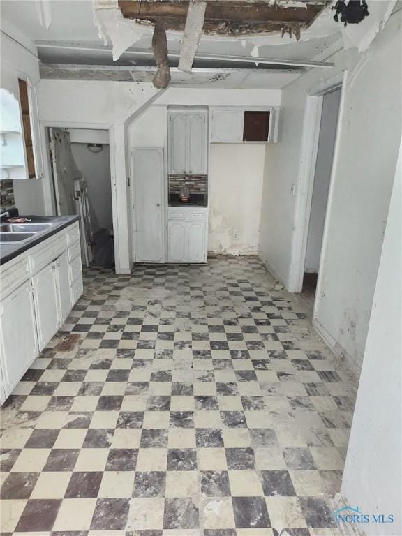 kitchen with sink and white cabinets