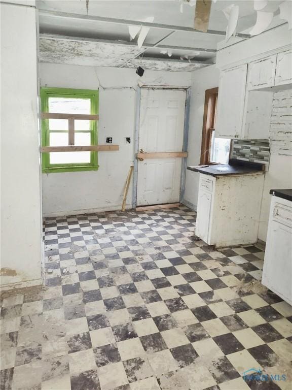 kitchen with white cabinets