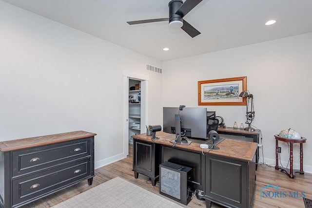 office area featuring ceiling fan and light hardwood / wood-style floors