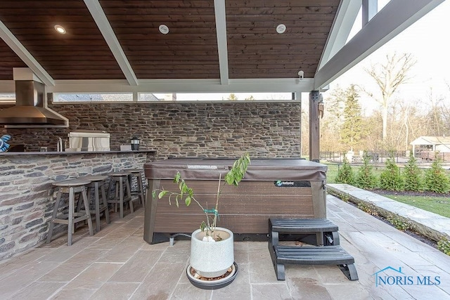 view of patio / terrace featuring a bar