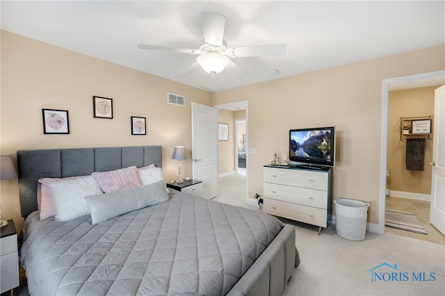 carpeted bedroom featuring ceiling fan