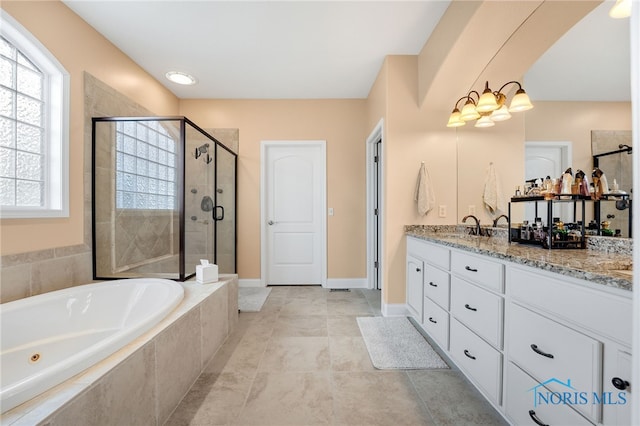 bathroom featuring tile patterned flooring, vanity, and independent shower and bath