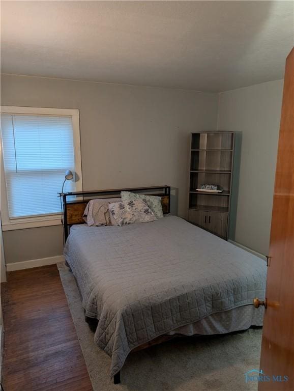 bedroom featuring hardwood / wood-style floors