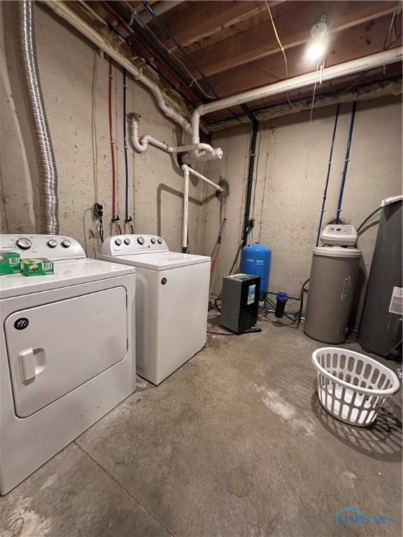 laundry room with washer and dryer and laundry area