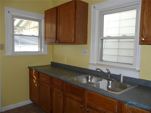 kitchen featuring sink and a healthy amount of sunlight