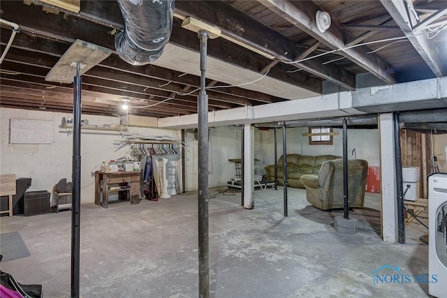 basement with washer / clothes dryer