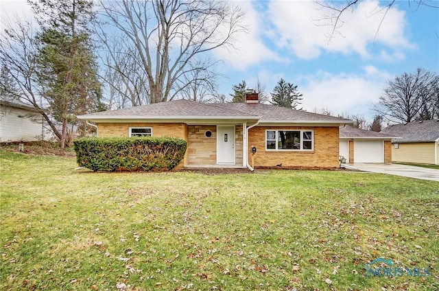 ranch-style house with a front lawn and a garage