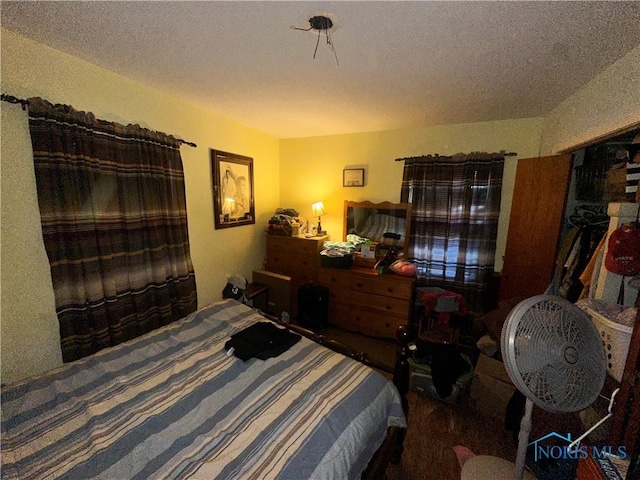 bedroom featuring a textured ceiling