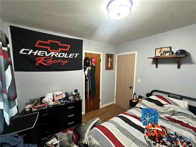 bedroom with a textured ceiling