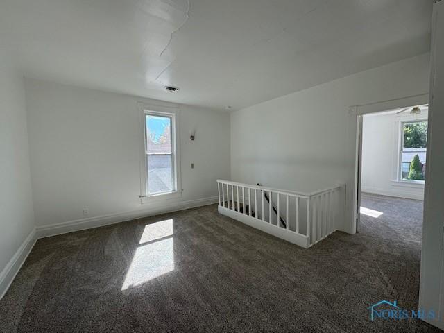 view of carpeted spare room