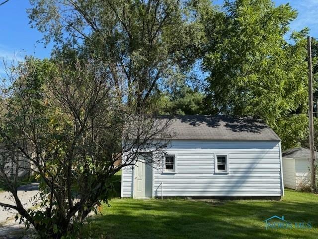 view of home's exterior featuring a yard