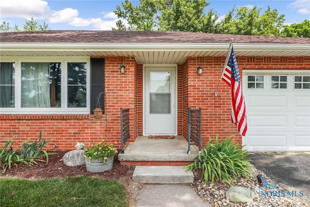 property entrance featuring a garage