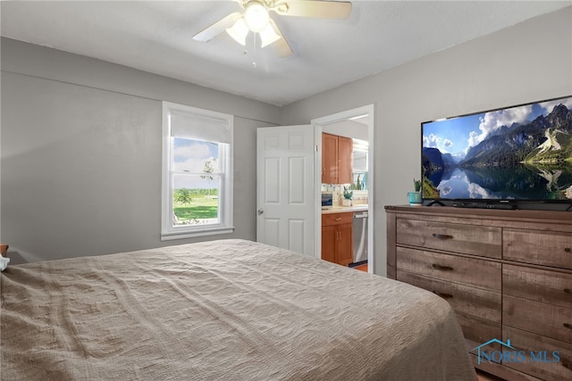 bedroom with ceiling fan and ensuite bathroom