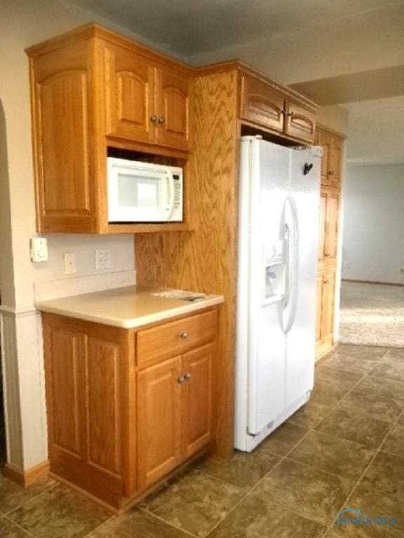 kitchen featuring white appliances