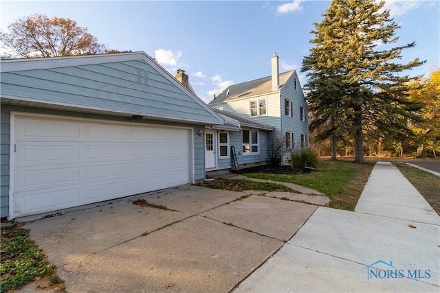 front of property featuring a garage