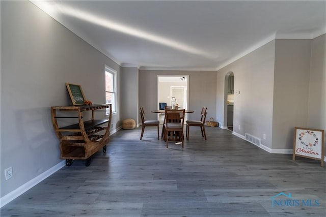 dining space featuring hardwood / wood-style flooring