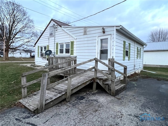 exterior space with a front lawn