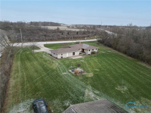 birds eye view of property featuring a rural view