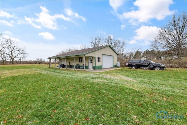 view of property exterior featuring a garage and a lawn