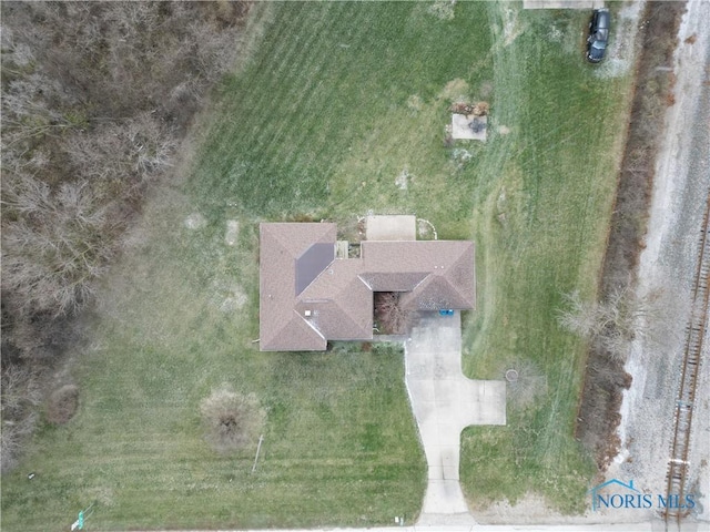 birds eye view of property with a rural view