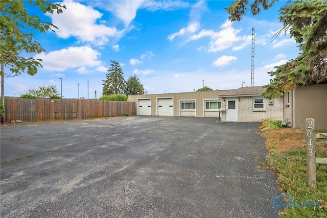 single story home featuring a garage