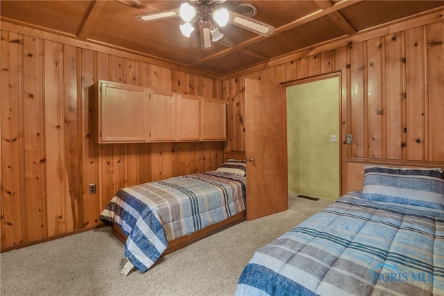 carpeted bedroom featuring ceiling fan, wooden ceiling, and coffered ceiling