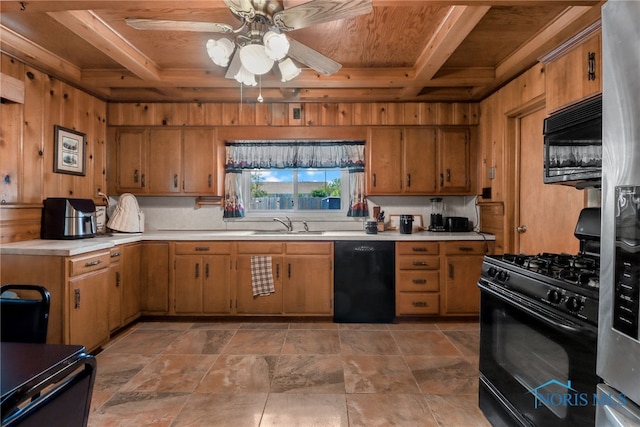 kitchen featuring black appliances, wood walls, wooden ceiling, and coffered ceiling