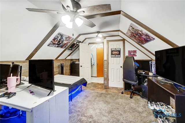 bedroom featuring carpet, ceiling fan, and vaulted ceiling