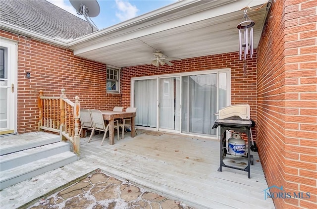 wooden deck with ceiling fan