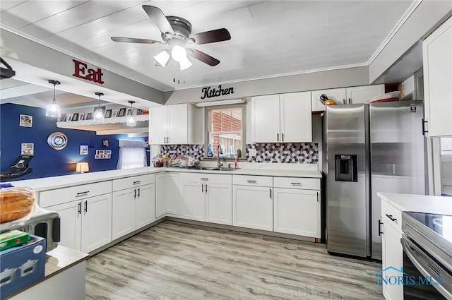 kitchen featuring stainless steel refrigerator with ice dispenser, backsplash, decorative light fixtures, white cabinets, and light hardwood / wood-style floors