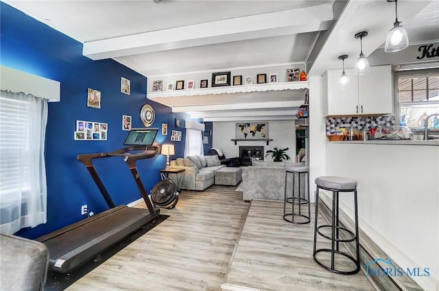 interior space with sink and light hardwood / wood-style flooring