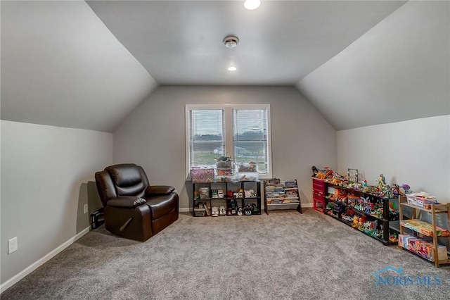 rec room with carpet flooring and lofted ceiling