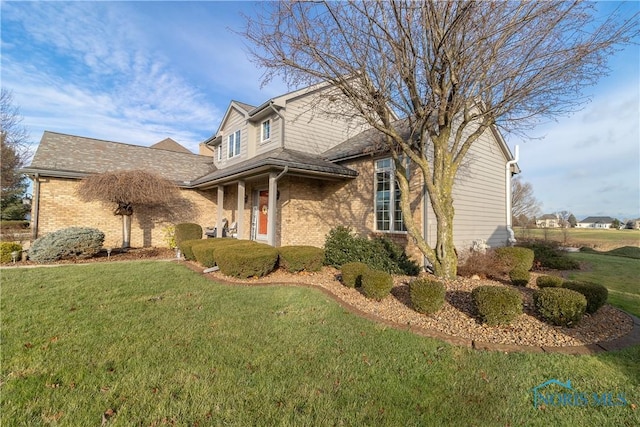 view of front of property with a front lawn