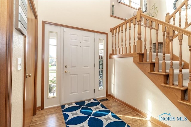 foyer entrance featuring hardwood / wood-style flooring