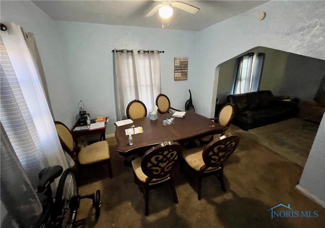 dining room featuring ceiling fan