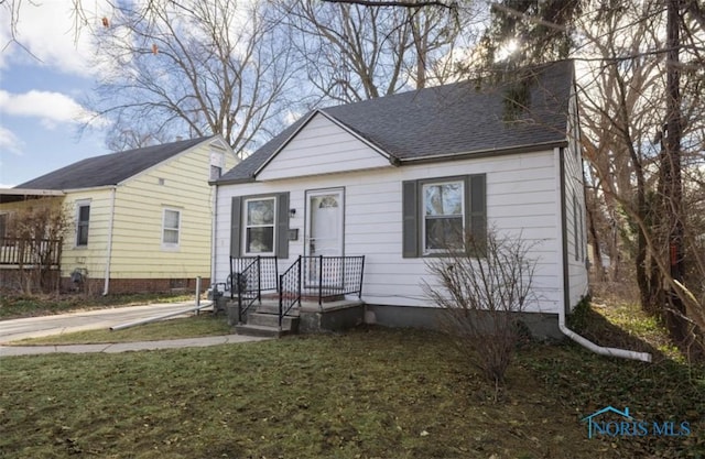 bungalow with a front yard